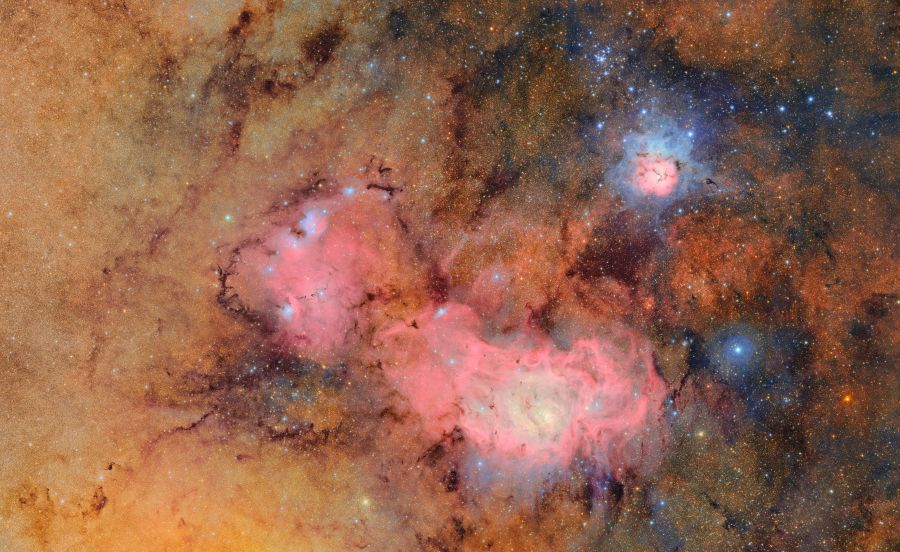Vera C. Rubin Observatory's first light images of the Trifid and Lagoon nebulas. This image combines 678 separate images taken by NSF-DOE Vera C. Rubin Observatory in just over seven hours of observing time. Combining many images in this way clearly reveals otherwise faint or invisible details, such as the clouds of gas and dust that comprise the Trifid nebula (top right) and the Lagoon nebula, which are several thousand light-years away from Earth. Credits: NSF-DOE Vera C. Rubin Observatory.