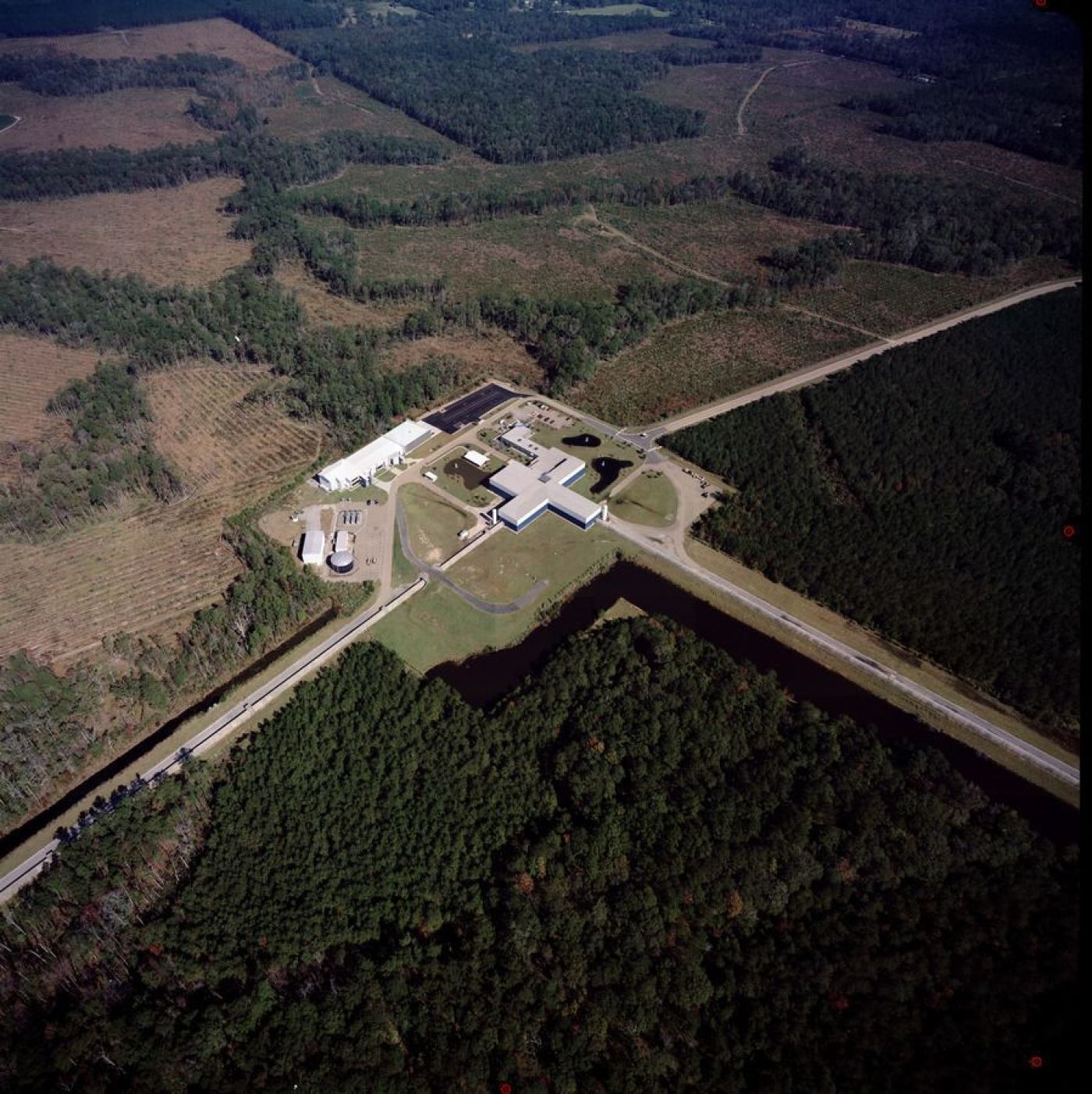   LIGO Laboratory operates two detector sites, one near Hanford in eastern Washington, and another near Livingston, Louisiana. This photo shows the Livingston detector site. Credits: Caltech/MIT/LIGO Lab 